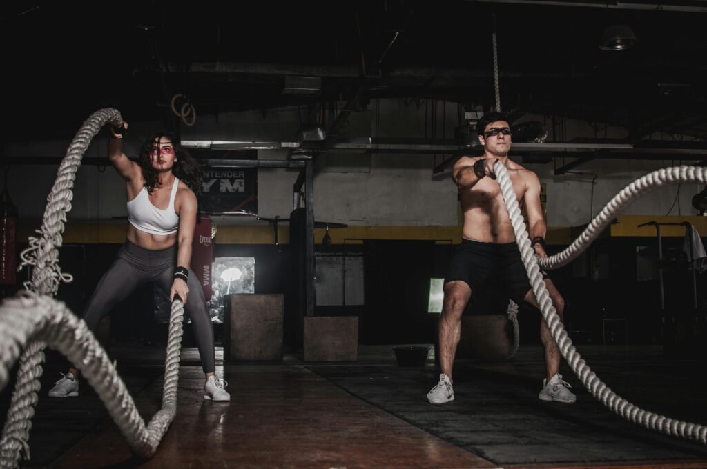 man and woman exercising to set fire to their metabolism